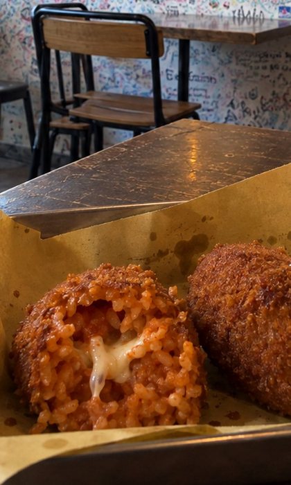 A saved Instagram Reel: supplì with melted mozzarella