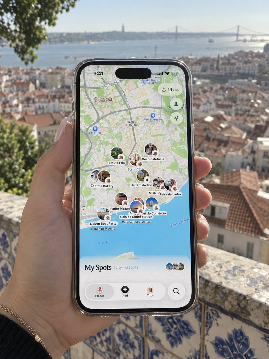 Dream Trip open on an iPhone in Lisbon, with saved spots pinned on the city map